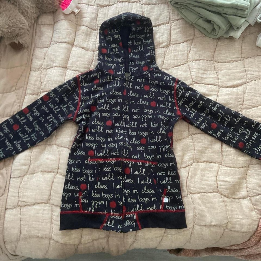 black and red graphic zip up with design all throughout